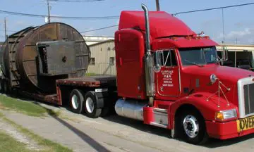A flatbed tractor trailer