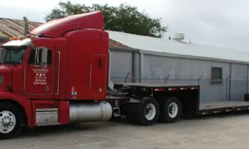 A drop deck tractor trailer